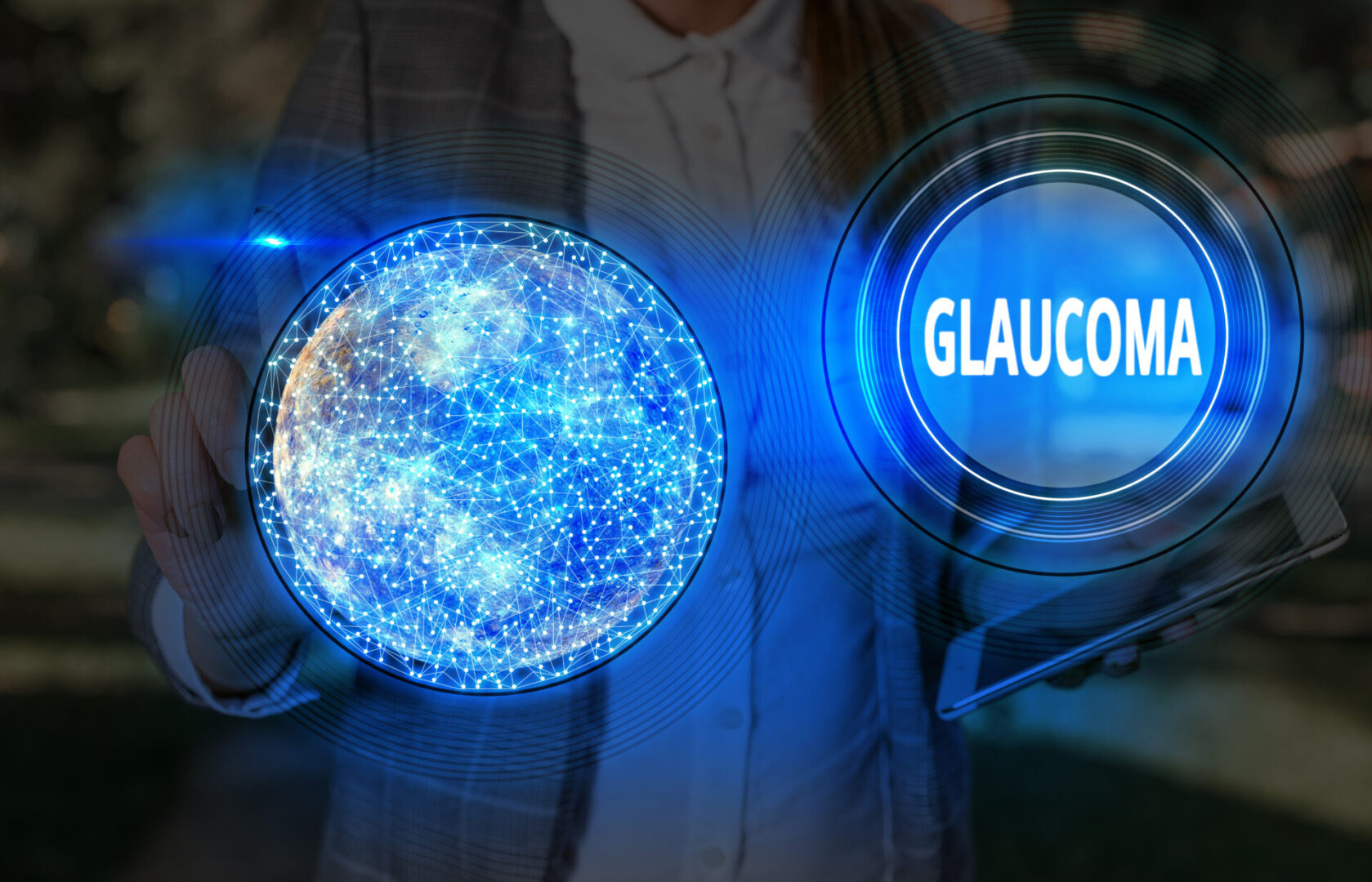 A person holding a glass with the word glaucoma written on it.